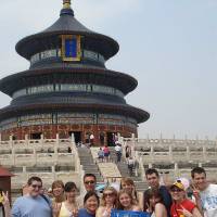 Group photo with flag at temple